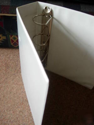 A4 used esselte white four ring - ring binder. 98P