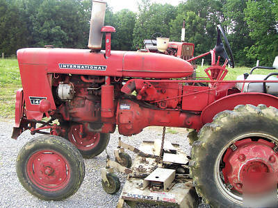 1974 farmall 140 tractor w/ woods L59 belly mower