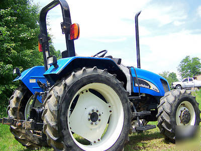 New holland TL100 a 4X4 diesel tractor loader 95 hp