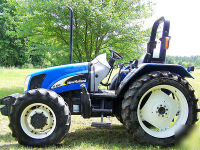 New holland TL100 a 4X4 diesel tractor loader 95 hp