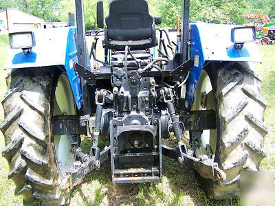 New holland TL100 a 4X4 diesel tractor loader 95 hp