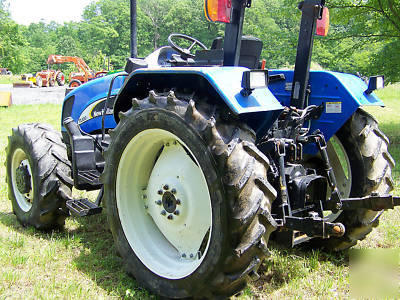 New holland TL100 a 4X4 diesel tractor loader 95 hp