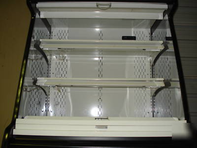 Structural concept lighted refrigerated display case