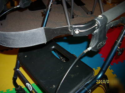 Nova. sit-or stand behind rolling walker