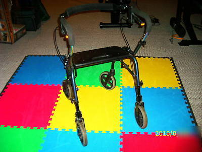 Nova. sit-or stand behind rolling walker