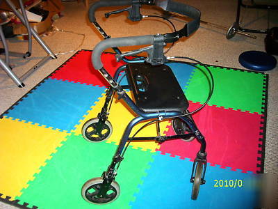 Nova. sit-or stand behind rolling walker