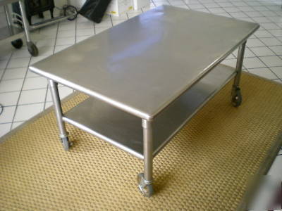 Contemporary modern stainless coffee table w/ casters