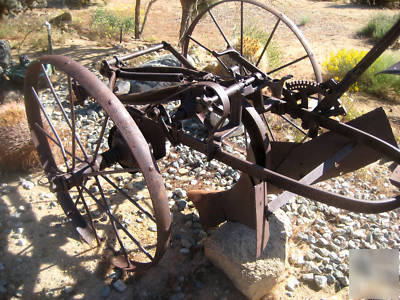 Horse drawn riding plow
