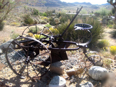 Horse drawn riding plow