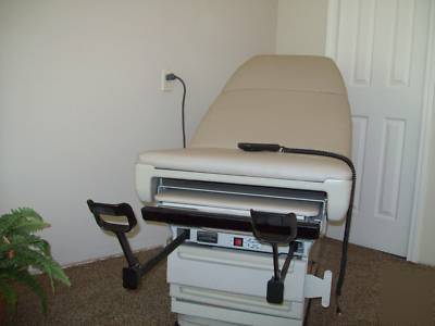 One midmark 405 medical power examtable (2 available)