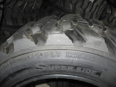 Set of (4) 10 x 16.5 (10 ply) skid steer / bobcat tires