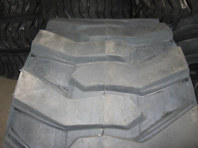 Set of (4) 10 x 16.5 (10 ply) skid steer / bobcat tires