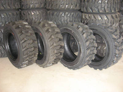 Set of (4) 10 x 16.5 (10 ply) skid steer / bobcat tires