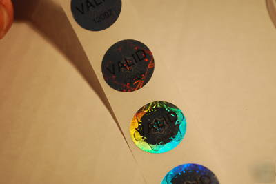 100 valid pre-numbered tamper evident hologram labels