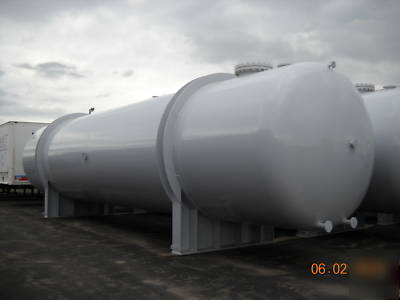 New 4 carbon steel storage tanks 28,000 gal. +/-