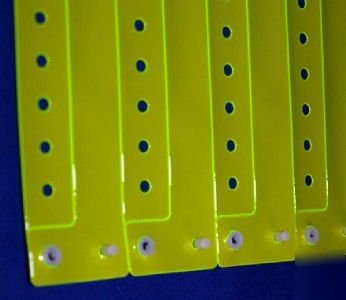 100 neon yellow snap on vinyl wristbands event arm band