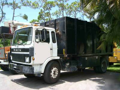 Bucket boom truck, mack dump truck, stump grinder +more