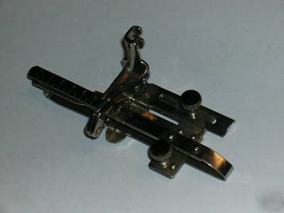 Singer #36583 featherweight 221 tucker foot attachment