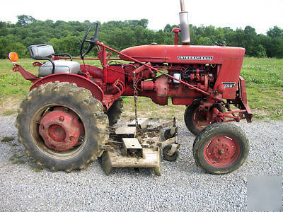 1974 farmall 140 tractor w/ woods L59 belly mower
