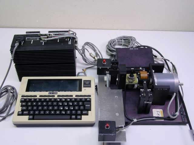 Computer controlled basic programmable material cutter